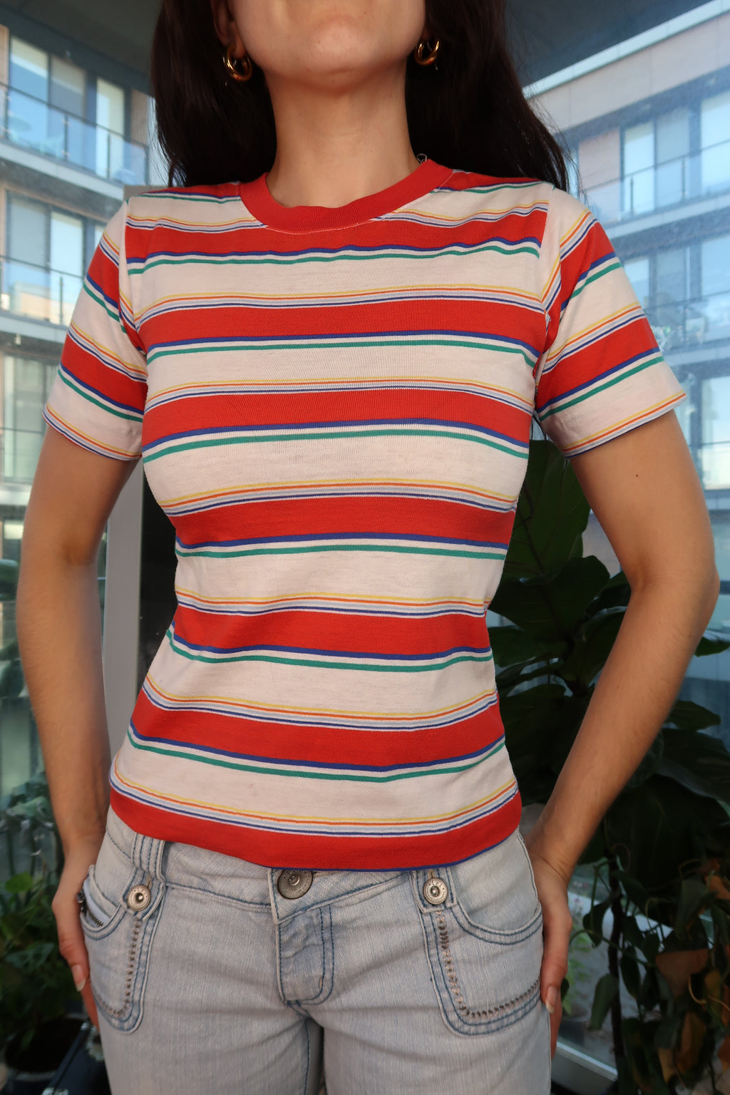 Vintage 80s red and white striped fitted ringer tee for women by Elektra Vintage, showing a casual retro top with short sleeves.