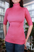 Pink ribbed turtleneck top for women by Elektra Vintage, 1970s fitted knit half-sleeve retro tee in vintage style.