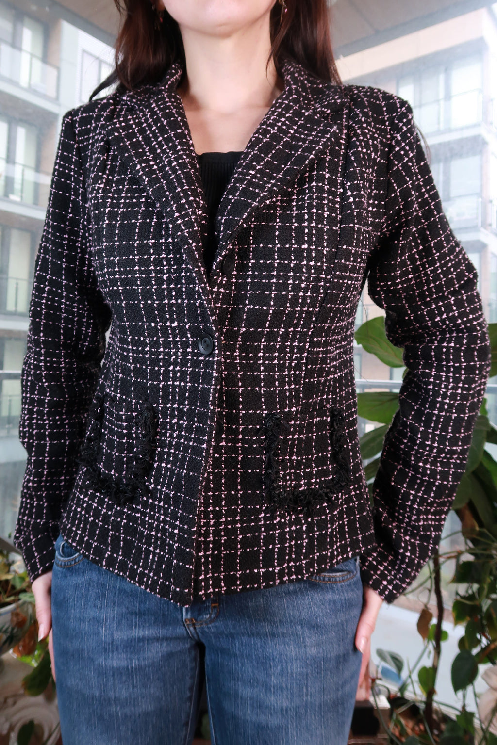 Women's vintage black and pink tweed blazer by Elektra Vintage, tailored bouclé jacket with frayed pocket detail.