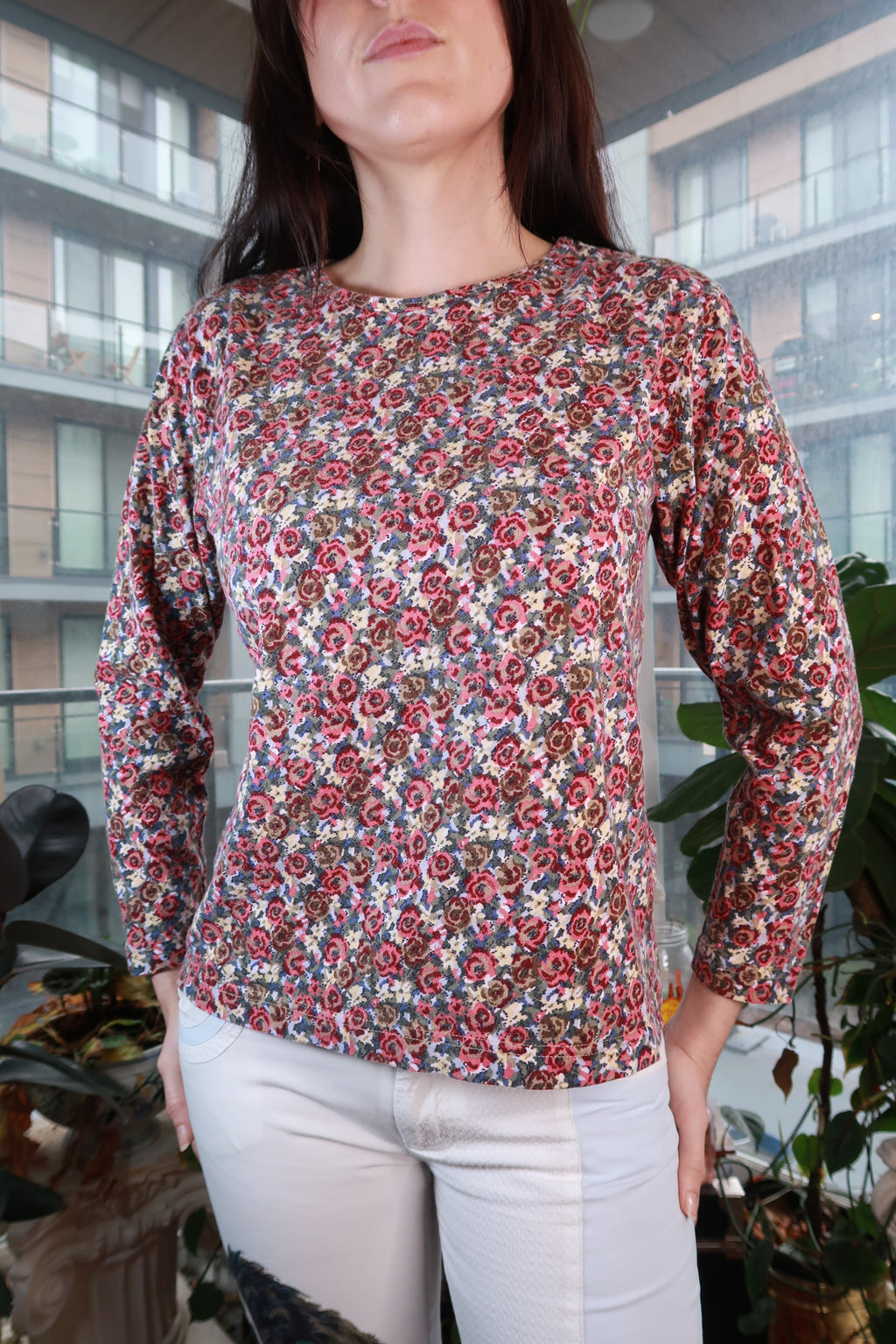 Women's vintage 2000s floral long sleeve top by Elektra Vintage, fitted crewneck shirt with micro floral print, Y2K style.