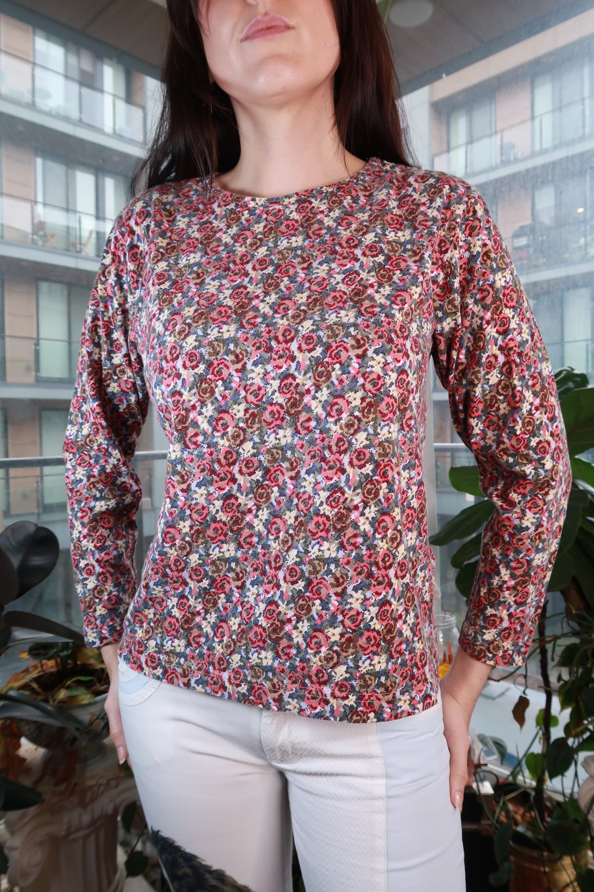 Women's vintage 2000s floral long sleeve top by Elektra Vintage, fitted crewneck shirt with micro floral print, Y2K style.
