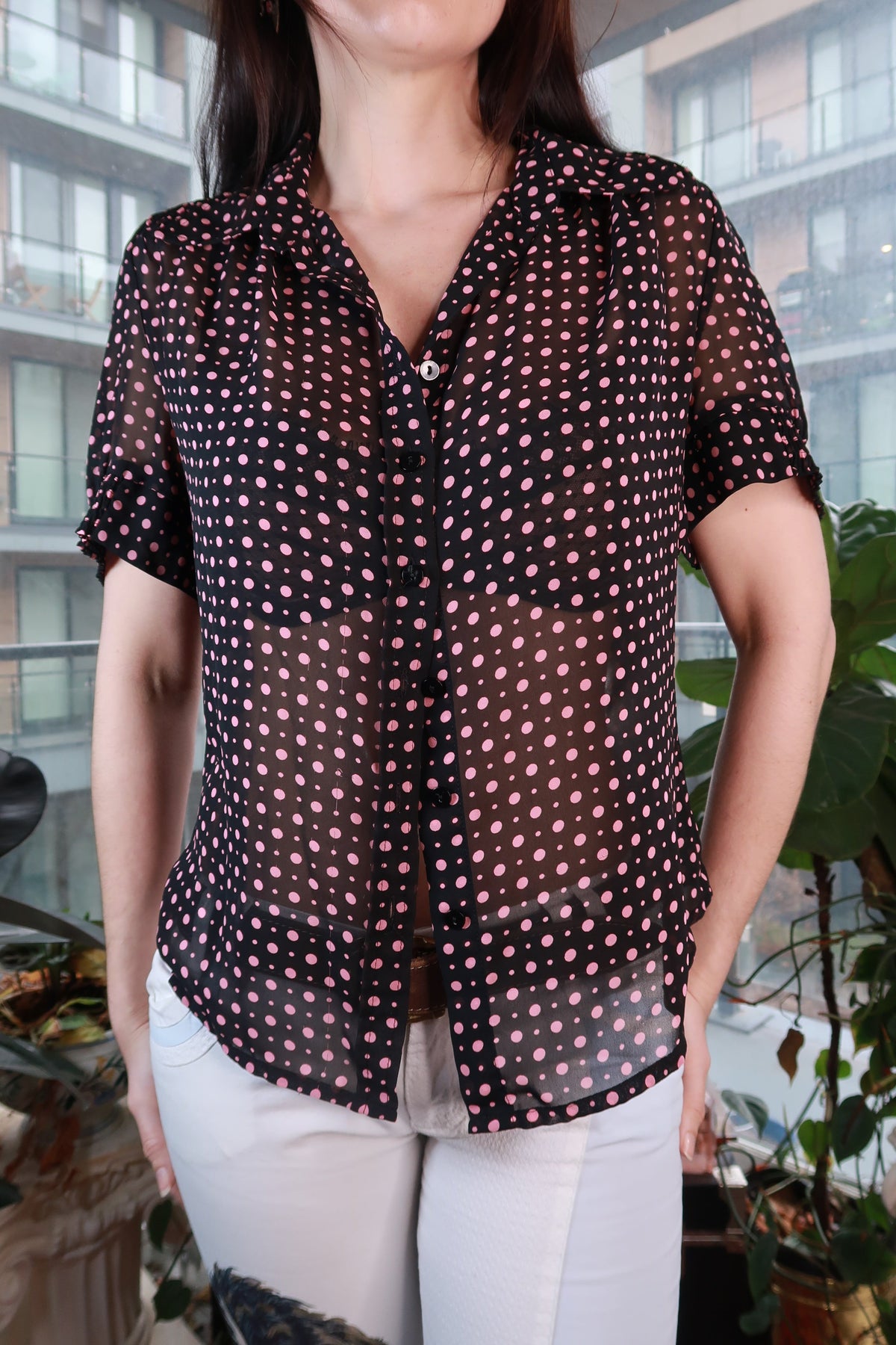 Vintage black sheer polka dot blouse by Elektra Vintage, women's Y2K pink dot button-up top with long sleeves.