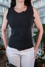 Load image into Gallery viewer, Black ribbed sleeveless tank top with raw edges, vintage 2000s style, by Elektra Vintage, shown on a woman.
