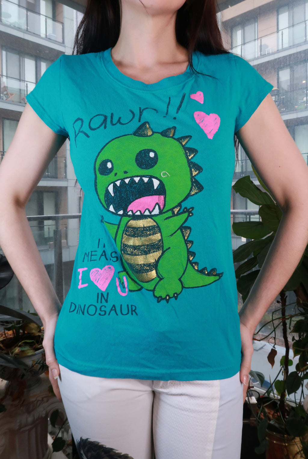 Women's vintage dinosaur graphic tee by Elektra Vintage featuring a "Rawr!!" design, perfect for cute Y2K kawaii style.
