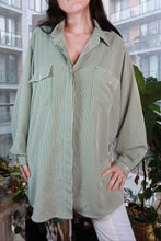 Load image into Gallery viewer, Vintage green and white pinstripe oversized women's button-up shirt by Elektra Vintage, shown laid flat with collar and buttons visible.
