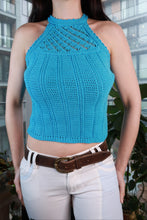 Load image into Gallery viewer, Vintage 2000s turquoise crochet halter knit crop top for women, featuring detailed crochet pattern and halter neckline.
