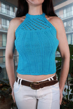Load image into Gallery viewer, Vintage 2000s turquoise crochet halter knit crop top for women, styled by Elektra Vintage, shown on a model.
