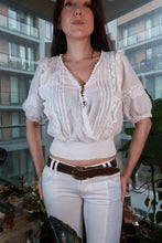 Load image into Gallery viewer, Vintage white lace peasant blouse for women by Elektra Vintage, boho smocked crop top with ruffled details and relaxed fit.
