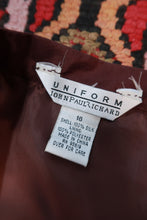 Load image into Gallery viewer, Chocolate brown silk embroidered mini skirt from Elektra Vintage, featuring intricate vintage embroidery and a stylish mini length.
