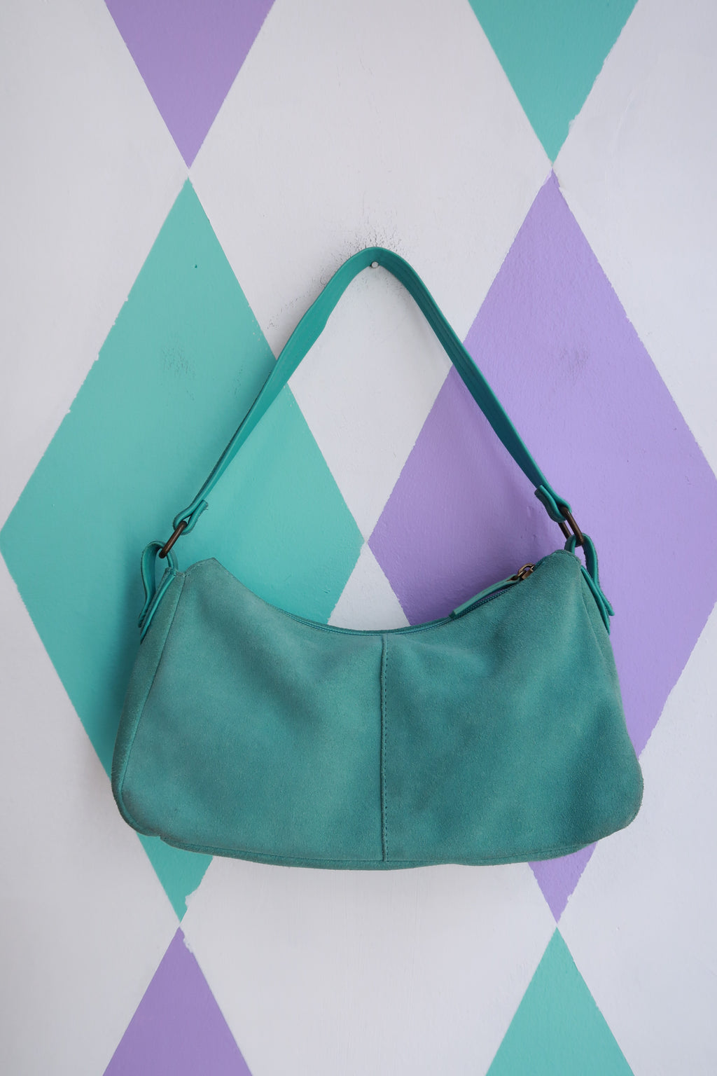 Vintage 2000s turquoise suede mini shoulder bag by Elektra Vintage, featuring a compact design and shoulder strap.