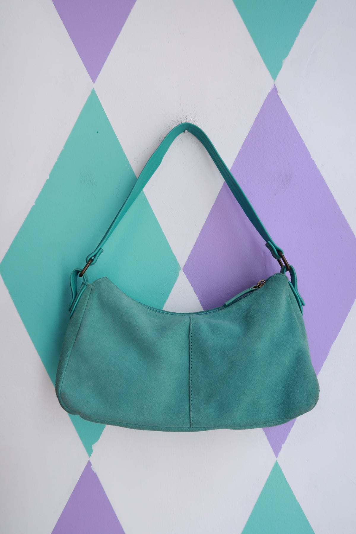 Vintage 2000s turquoise suede mini shoulder bag by Elektra Vintage, featuring a compact design and shoulder strap.