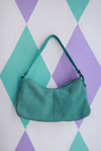 Load image into Gallery viewer, Vintage 2000s turquoise suede mini shoulder bag by Elektra Vintage, featuring a compact design and shoulder strap.
