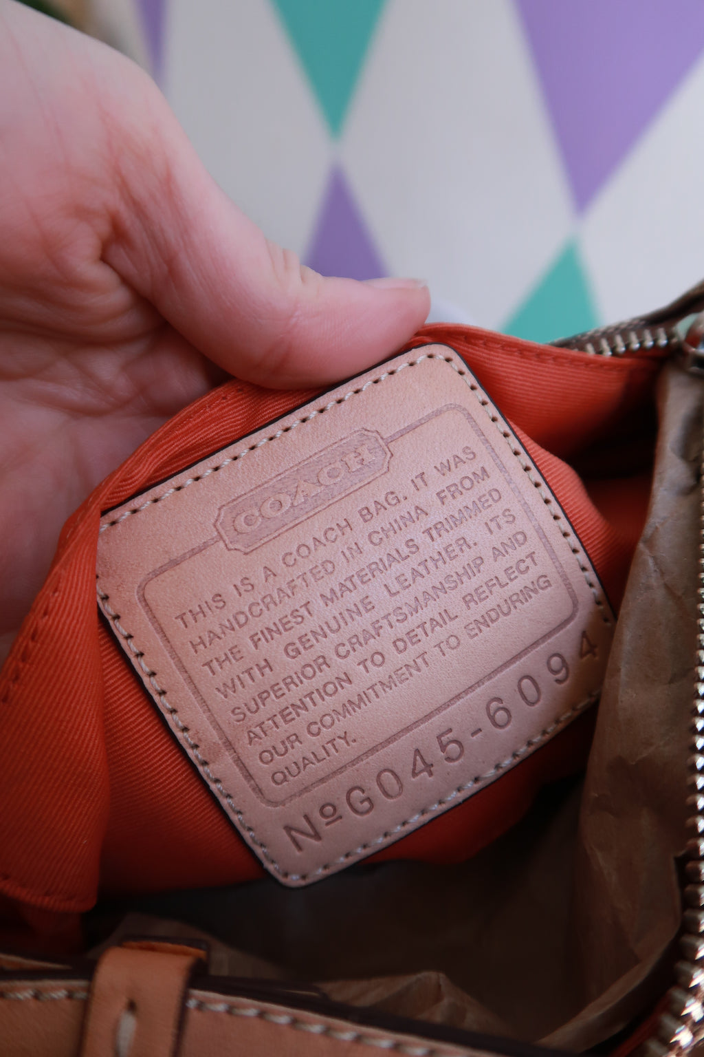 Vintage 2000s Coach Signature brown monogram canvas baguette shoulder bag with leather accents, from Elektra Vintage.