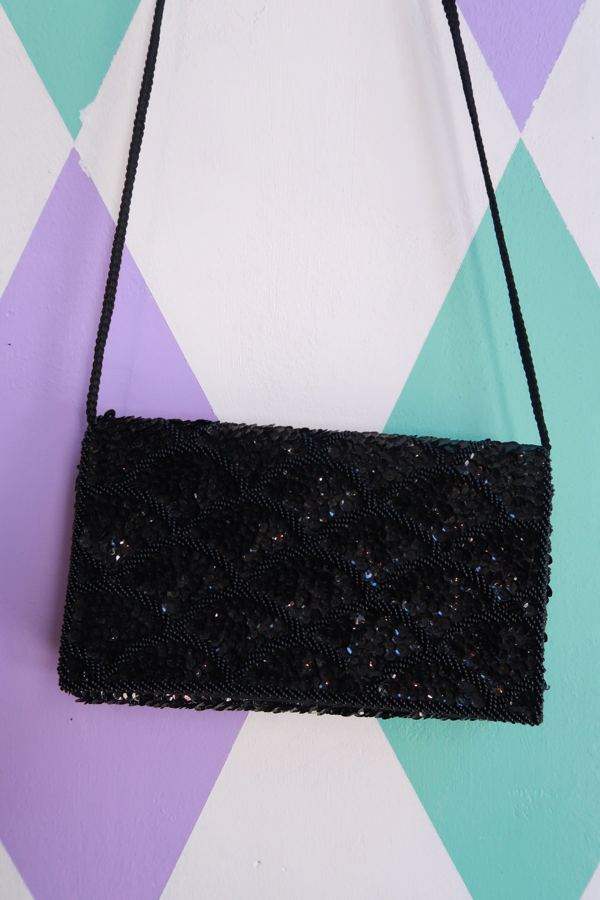 Black beaded sequin evening shoulder bag by Elektra Vintage, vintage 2000s style with elegant embellishments.