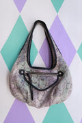 Elektra Vintage iridescent snakeskin print slouchy hobo shoulder bag from the 2000s with a textured, shiny surface and relaxed shape.