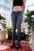 Women's vintage low-rise medium wash slim fit denim jeans by Elektra Vintage, showcasing classic 2000s style and medium wash denim.