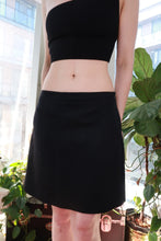 Load image into Gallery viewer, Vintage black wool blend mini skirt by Elektra Vintage, classic A-line tailored skirt with a fitted waist and smooth fabric.
