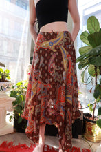 Load image into Gallery viewer, Vintage 2000s paisley midi skirt by Elektra Vintage, brown and red boho Y2K handkerchief hem skirt shown in the image.
