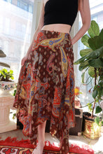 Load image into Gallery viewer, Vintage 2000s Paisley midi skirt by Elektra Vintage, boho Y2K brown and red handkerchief hem skirt with paisley pattern.
