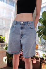 Load image into Gallery viewer, Men's vintage Calvin Klein denim shorts in light wash with relaxed fit, classic 90s/Y2K style, by Elektra Vintage.
