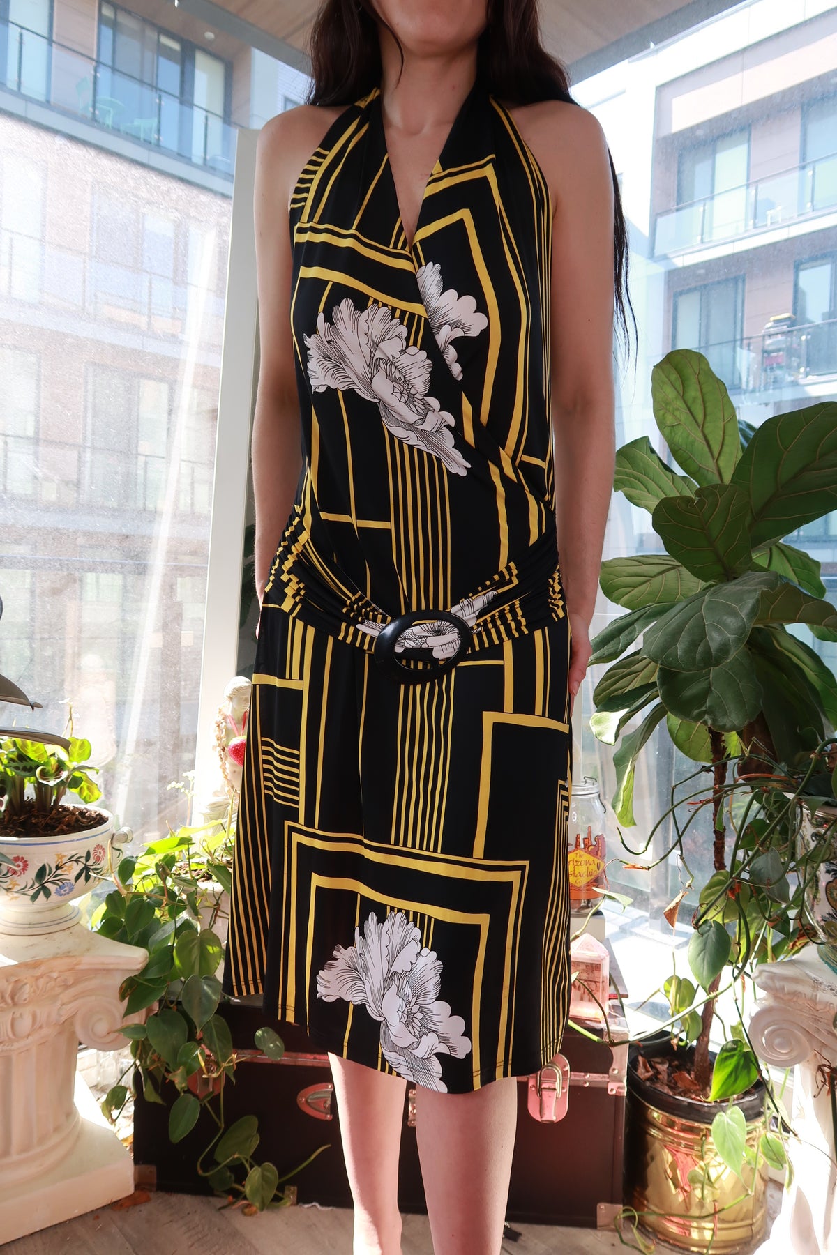Vintage 2000s black and gold geometric floral halter dress with ring detail by Elektra Vintage, featuring a fitted mini style.