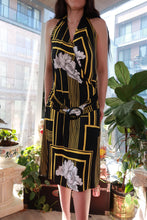 Load image into Gallery viewer, Vintage 2000s black and gold geometric floral halter dress with ring detail by Elektra Vintage, featuring a fitted mini style.
