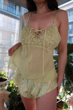 Load image into Gallery viewer, Y2K vintage lace camisole and satin shorts lingerie set in chartreuse green by Elektra Vintage, styled on a model.
