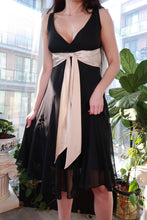 Load image into Gallery viewer, Black chiffon midi dress by Elektra Vintage featuring a champagne satin waist tie and vintage 2000s style.
