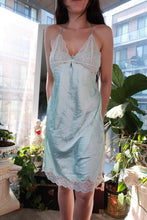Load image into Gallery viewer, Vintage 2000s Victoria’s Secret lace slip dress in aqua satin, featuring Y2K style and delicate lace details.
