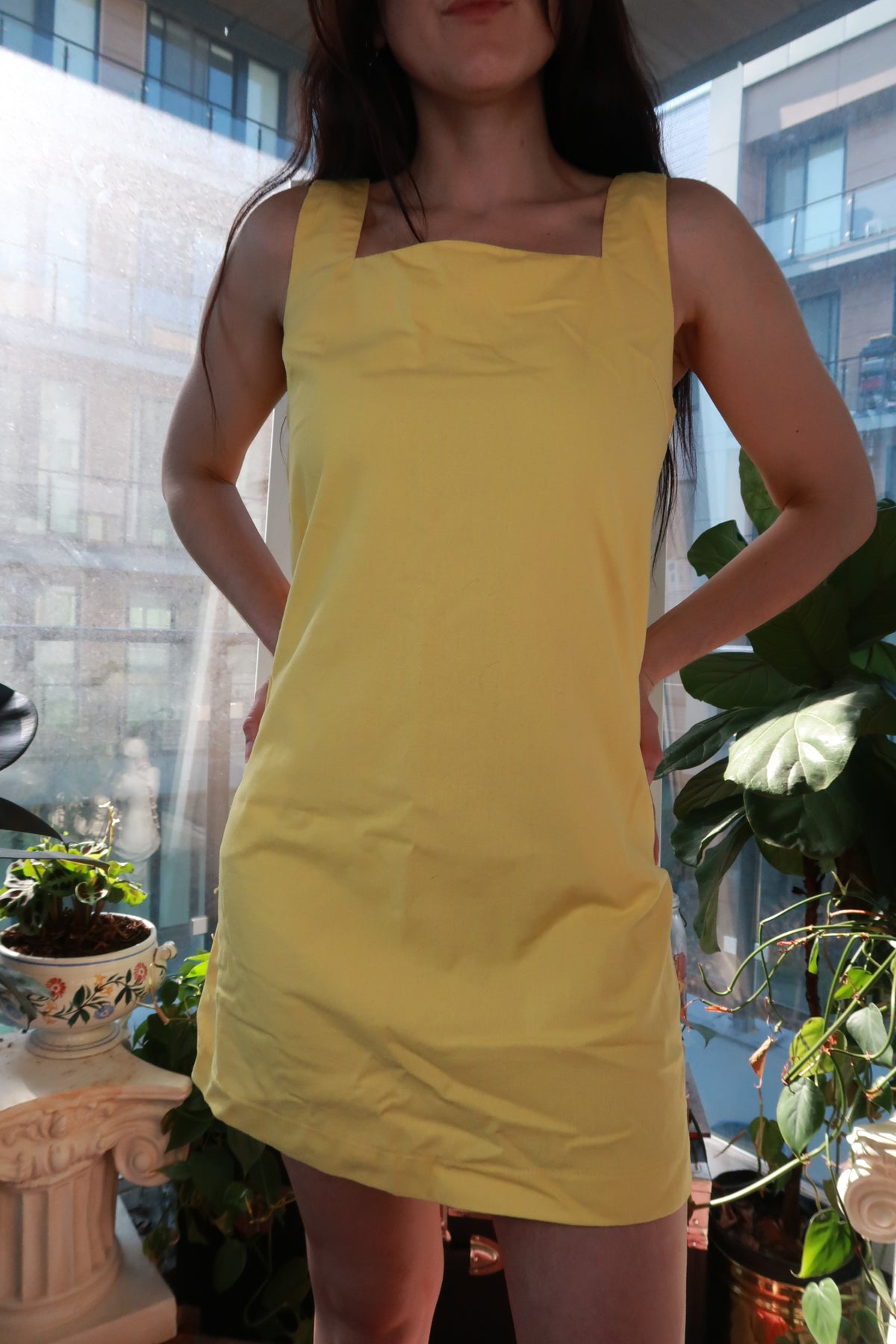 Vintage pastel yellow sleeveless shift dress with square neck, inspired by 90s Y2K style, by Elektra Vintage.