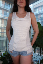 Load image into Gallery viewer, Women's white vintage BCBG tank top with Y2K panel design, fitted style from Elektra Vintage, shown on a hanger.
