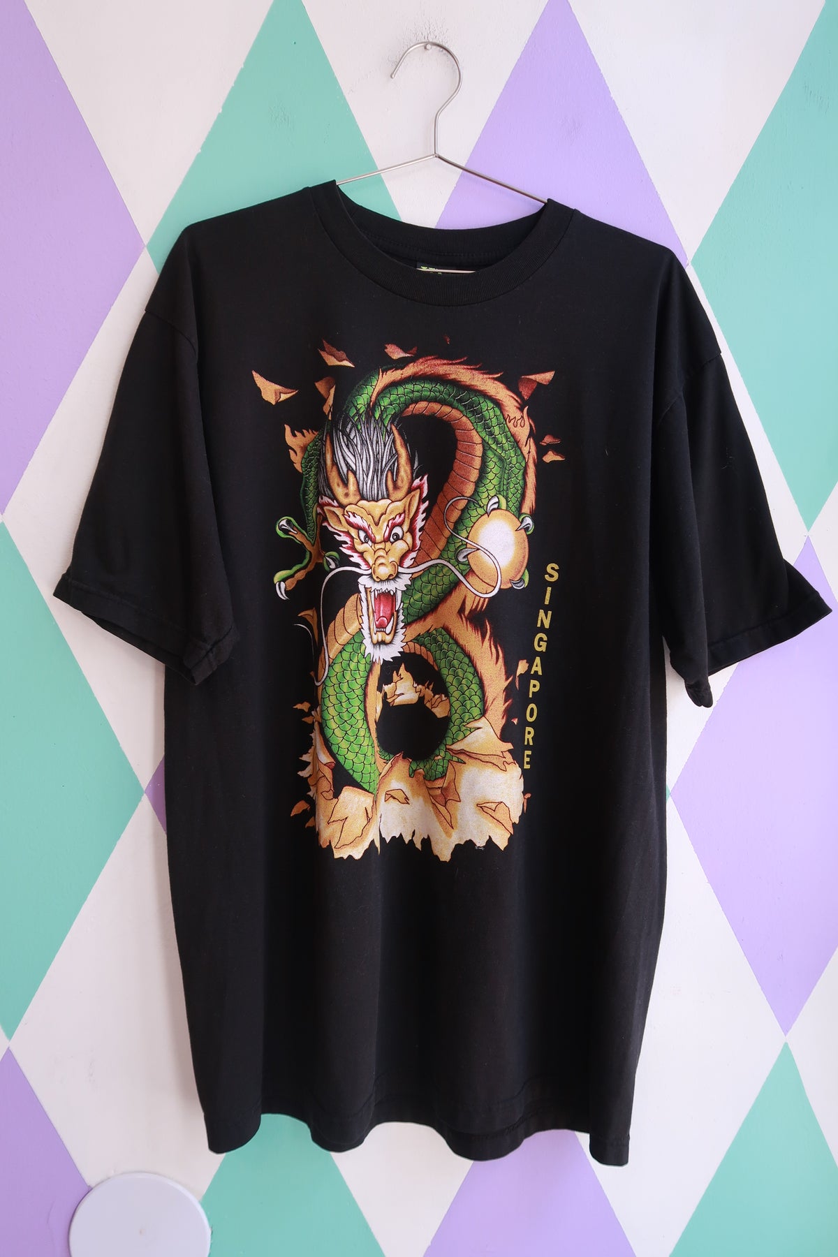 Black vintage 2000s Dragon graphic T-shirt for men by Elektra Vintage, double-sided design with vibrant dragon print.