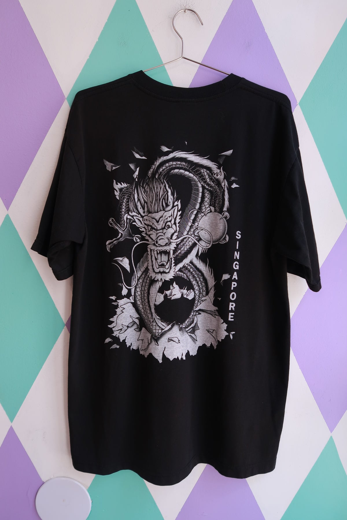 Black vintage 2000s Dragon graphic T-shirt by Elektra Vintage, double-sided men's top with vibrant dragon design in Singapore style.