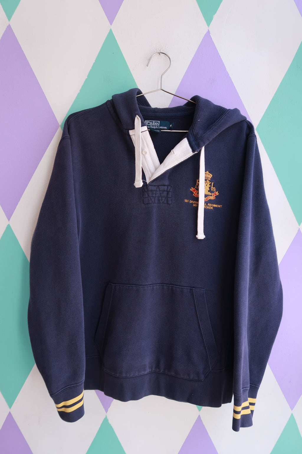 Men's navy crest rugby hoodie sweatshirt by Elektra Vintage featuring vintage Polo Ralph Lauren design and classic sporty style.