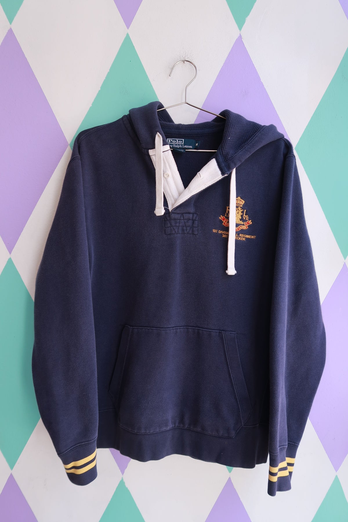 Men's navy crest rugby hoodie sweatshirt by Elektra Vintage featuring vintage Polo Ralph Lauren design and classic sporty style.