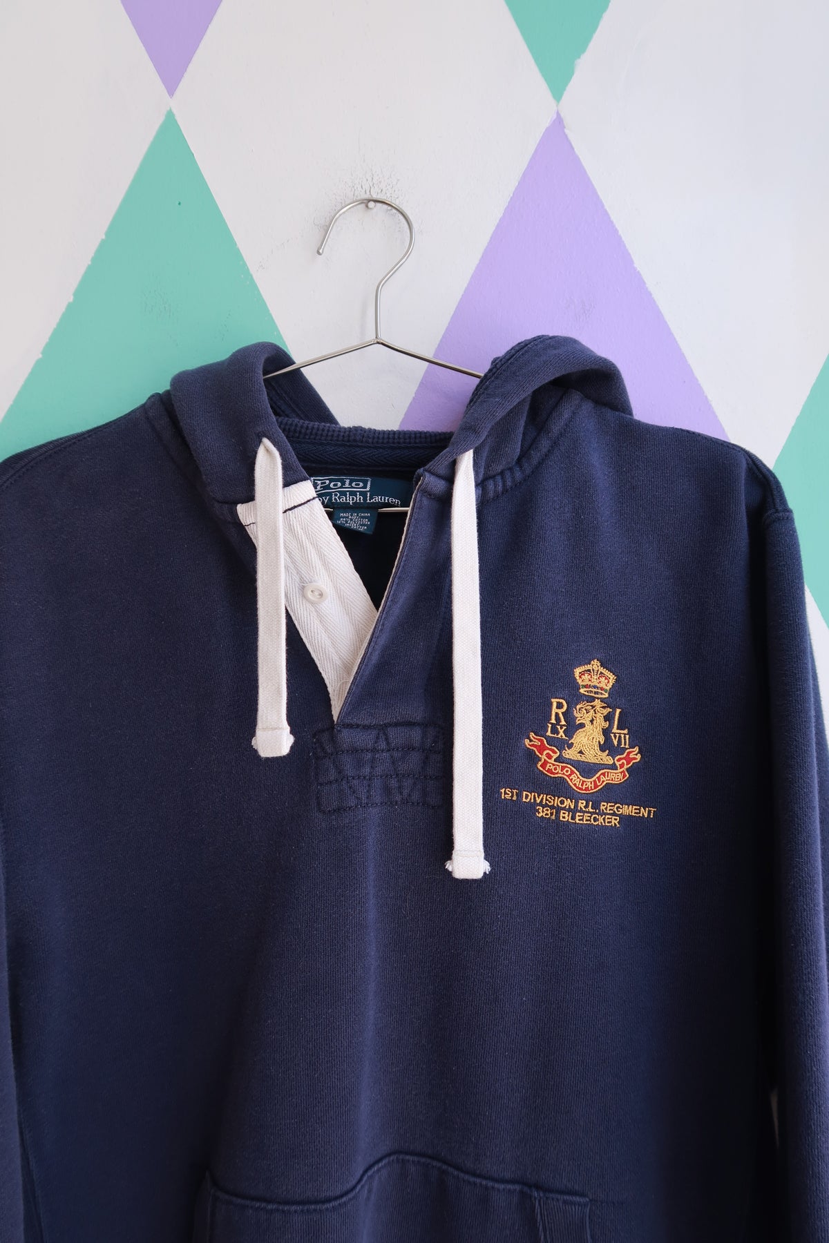 Men's navy crest rugby hoodie sweatshirt by Elektra Vintage, featuring a vintage Polo Ralph Lauren-inspired design and classic athletic style.