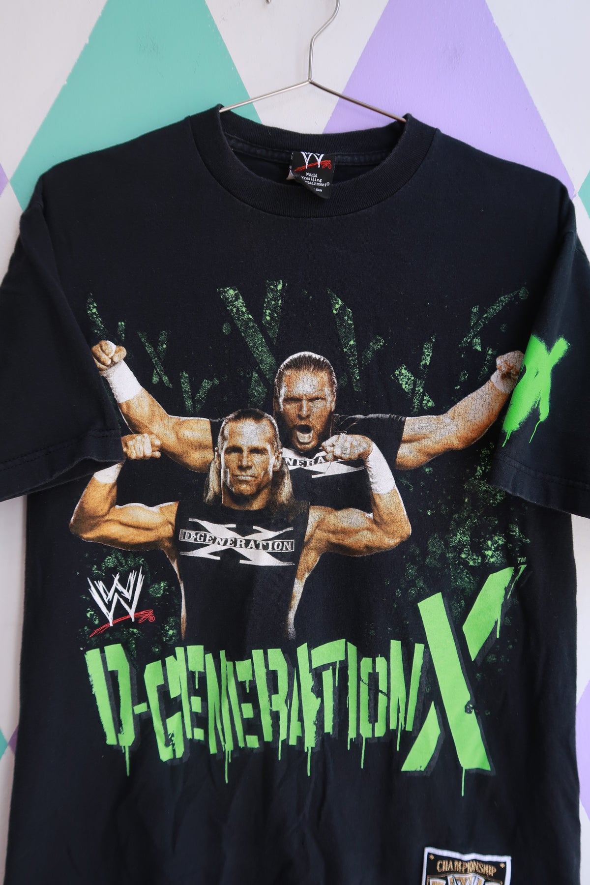 Black vintage WWE D-Generation X graphic T-shirt for men, dual-sided Elektra Vintage wrestling tee with DX logos.