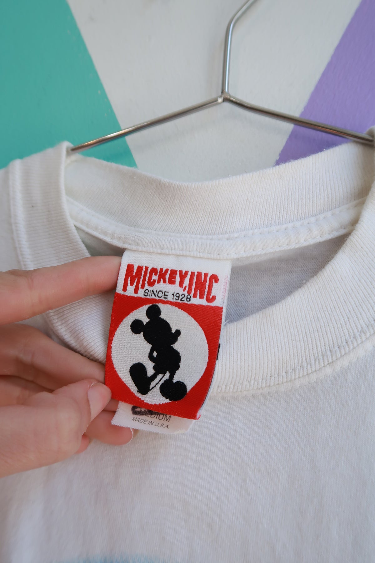 Men's vintage Walt Disney World 25 Years Mickey Fantasia Castle graphic tee by Elektra Vintage, featuring colorful Disney-themed artwork.