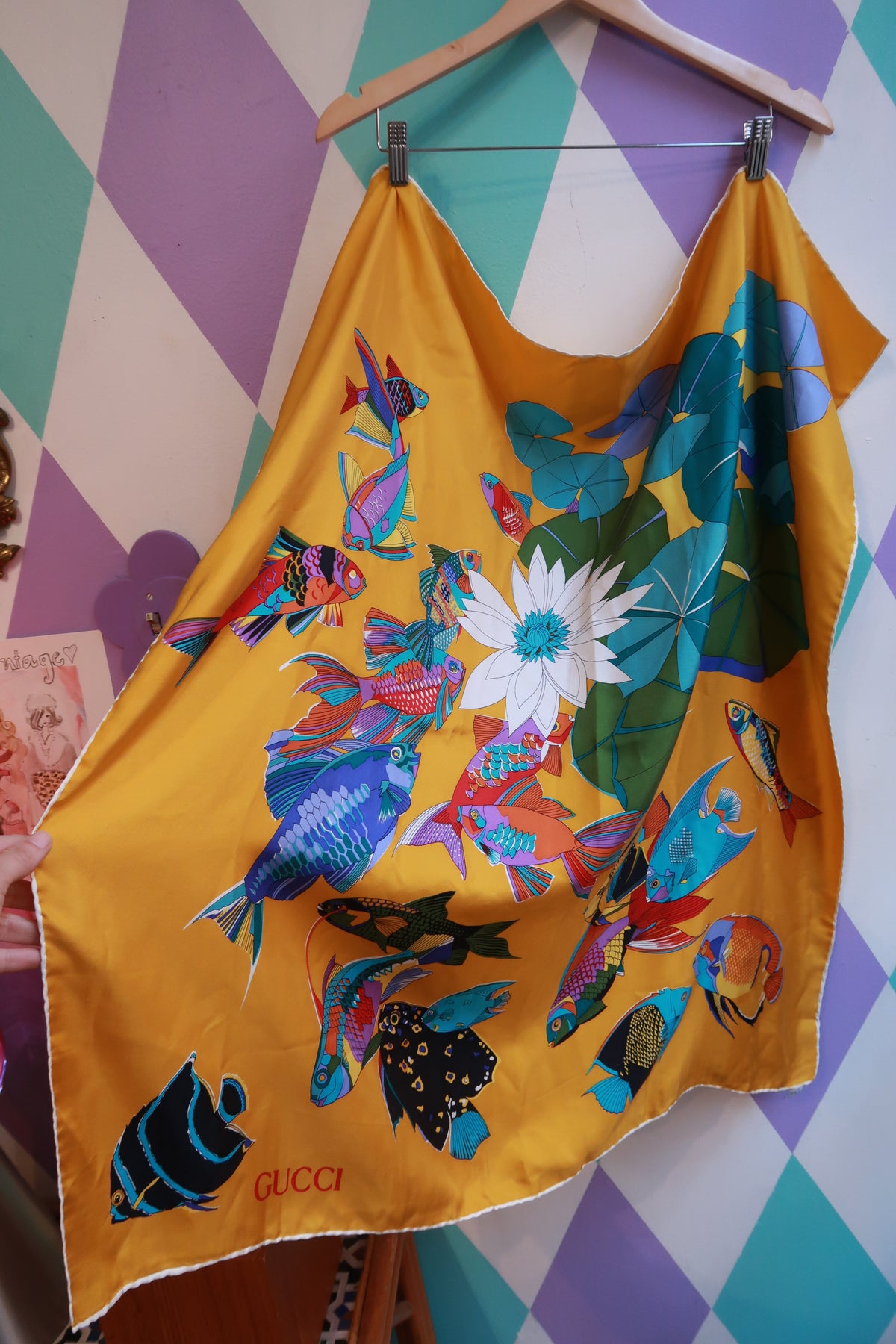 Vintage Gucci silk tropical fish scarf in golden yellow with multicolor tropical fish design, stylish designer silk accessory.