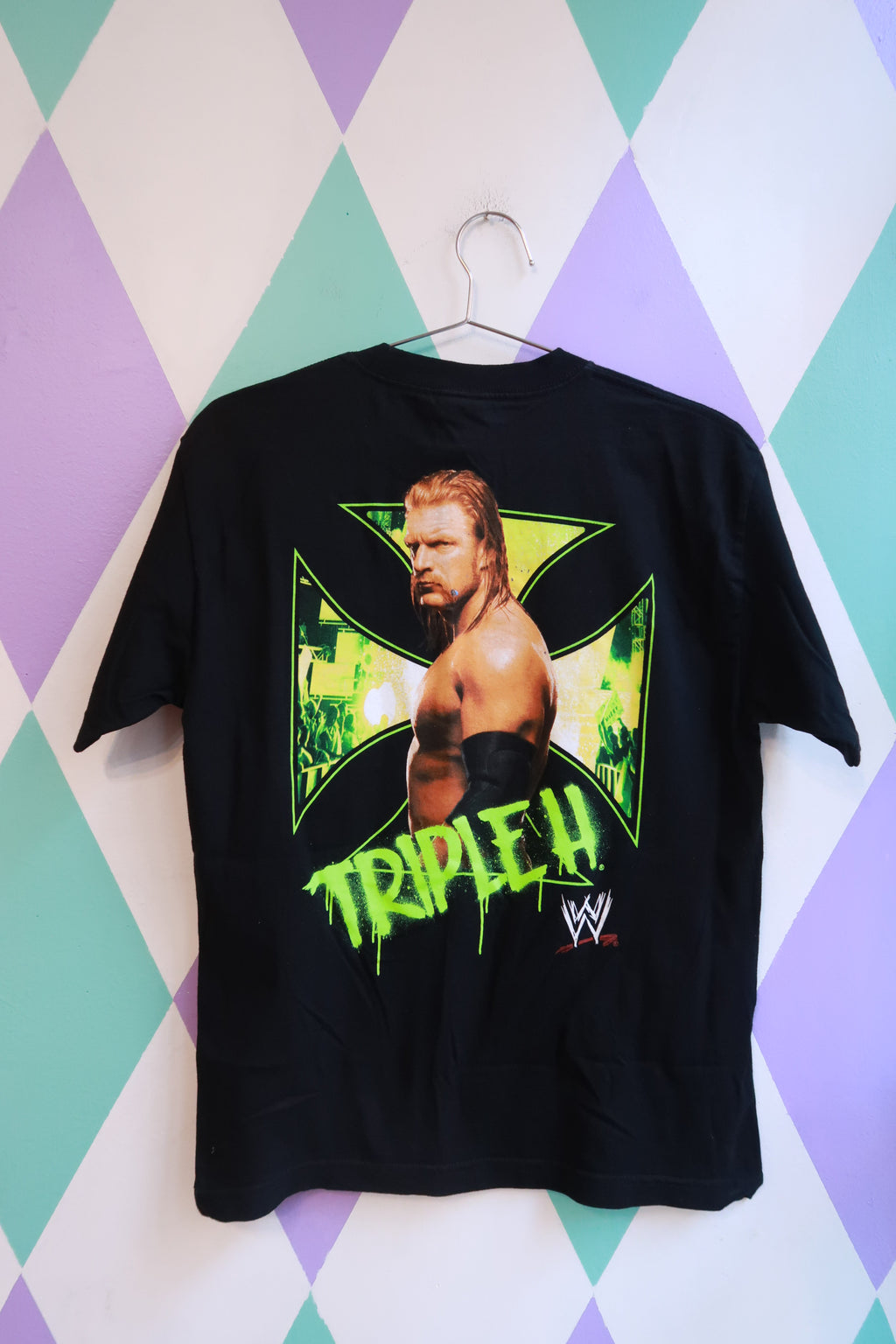 Vintage WWE Triple H graphic tee for men by Elektra Vintage, black neon wrestling shirt with Triple H design.