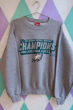 Load image into Gallery viewer, Men's vintage 2004 Philadelphia Eagles NFC Champions crewneck sweatshirt by Elektra Vintage, featuring team logo and classic design.
