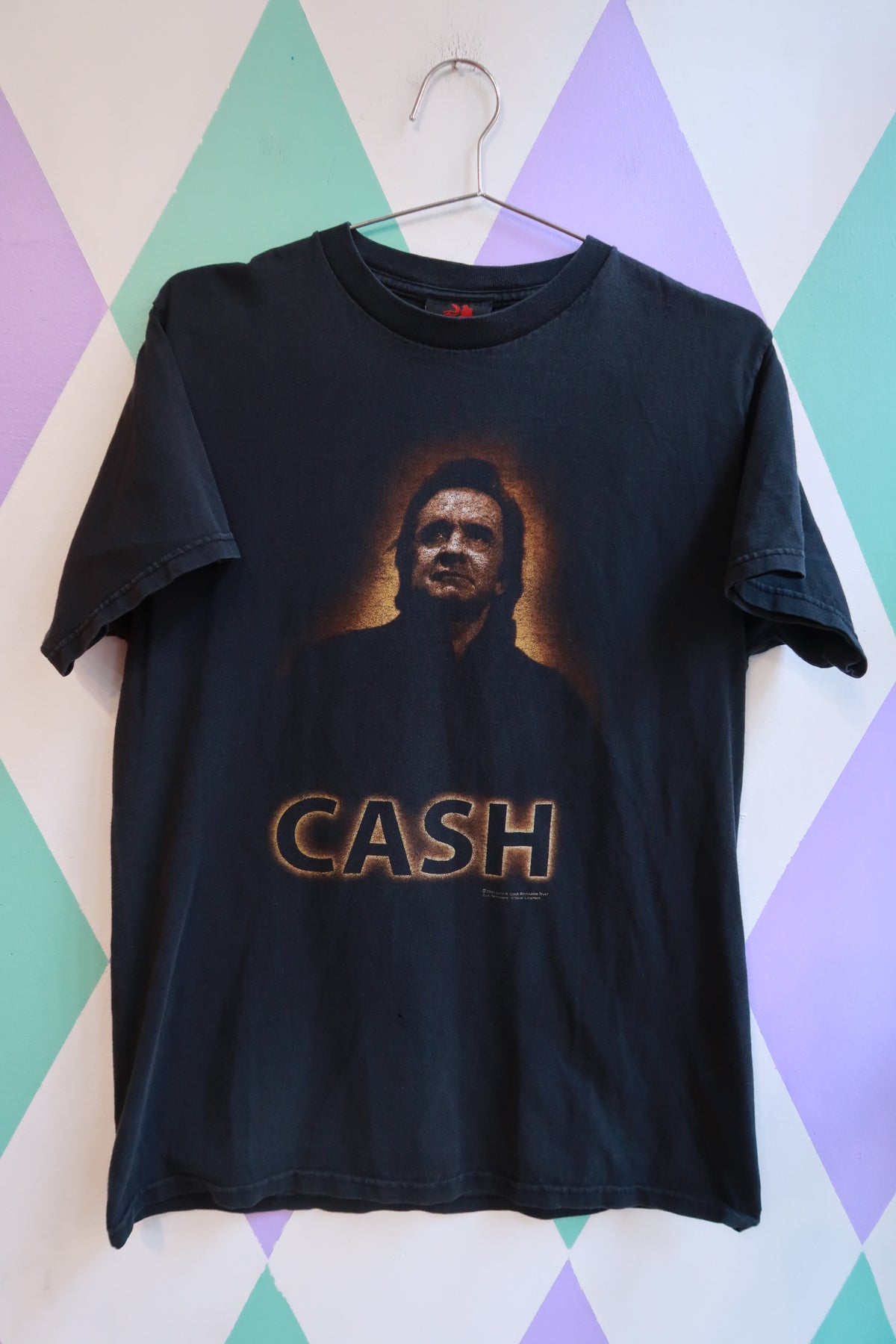 Men's vintage Johnny Cash graphic band T-shirt by Elektra Vintage, featuring a classic Johnny Cash design on a casual top.