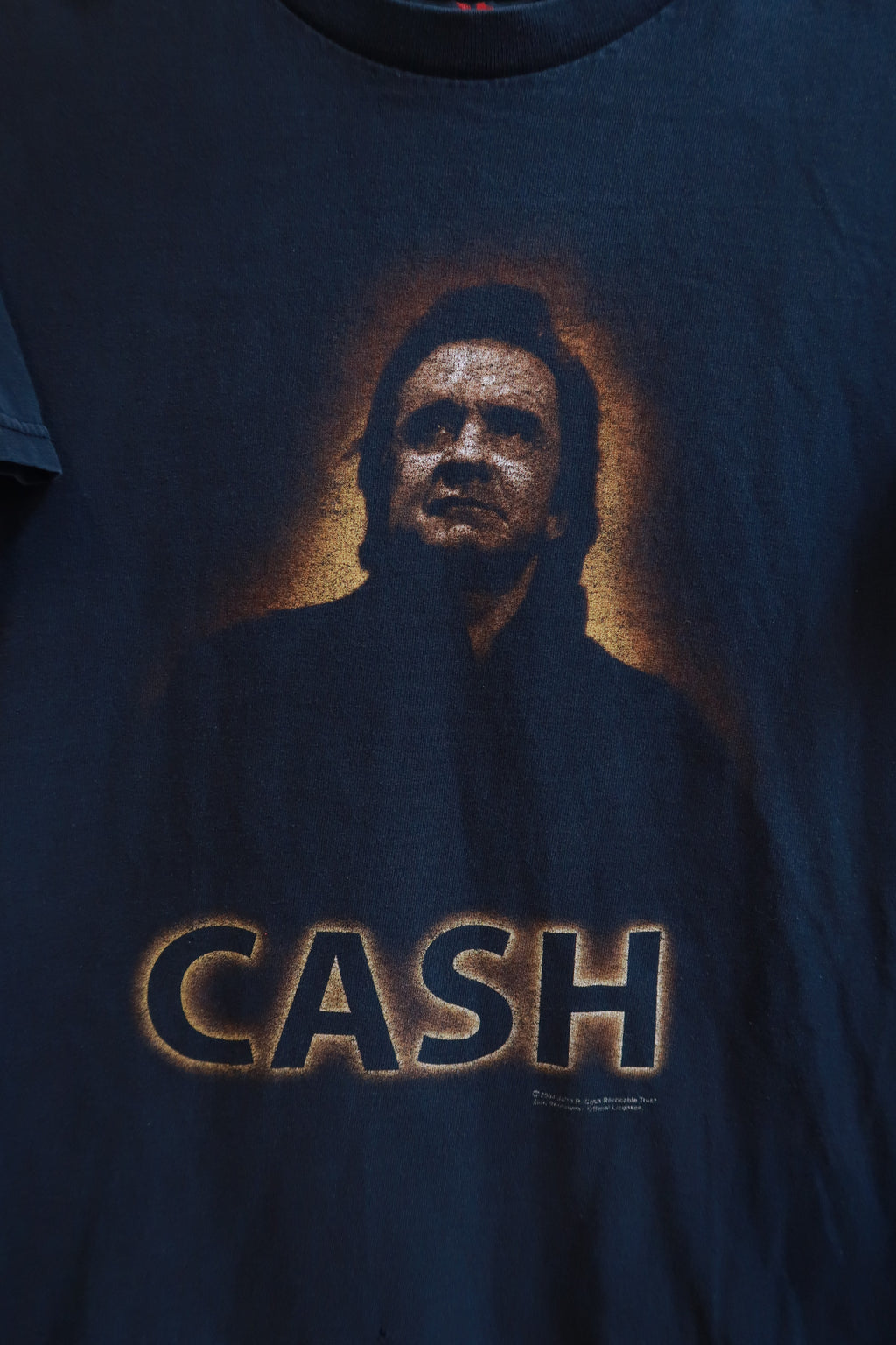 Men's vintage Johnny Cash graphic band T-shirt by Elektra Vintage, featuring a retro Johnny Cash design on soft cotton fabric.