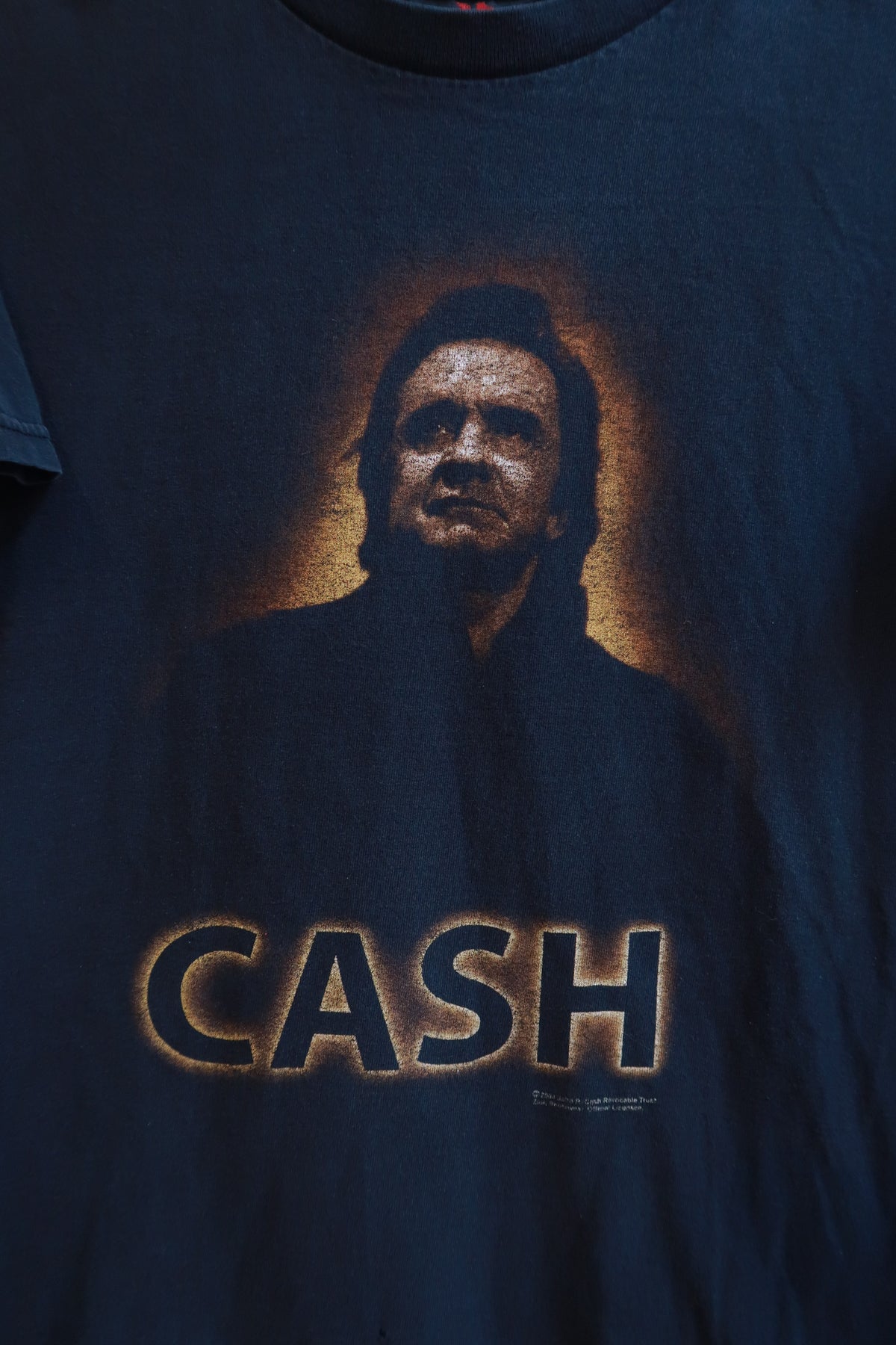 Men's vintage Johnny Cash graphic band T-shirt by Elektra Vintage, featuring a retro Johnny Cash design on soft cotton fabric.