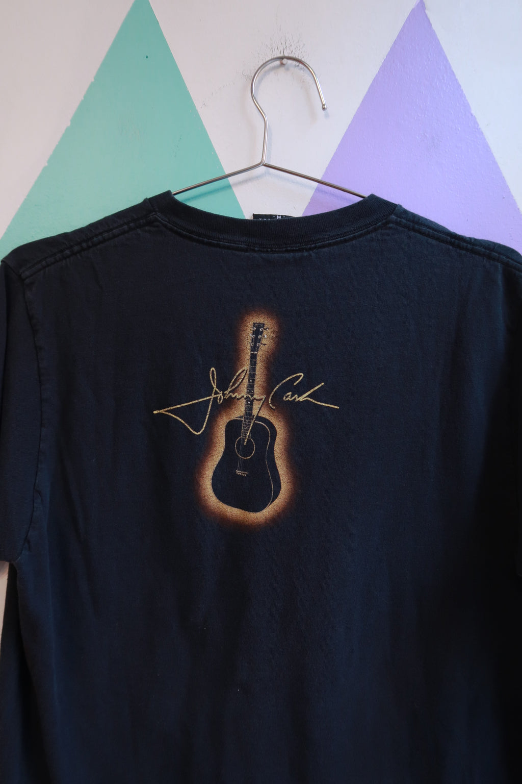 Men's vintage Johnny Cash graphic band T-shirt by Elektra Vintage, featuring a retro Johnny Cash design on a black cotton top.