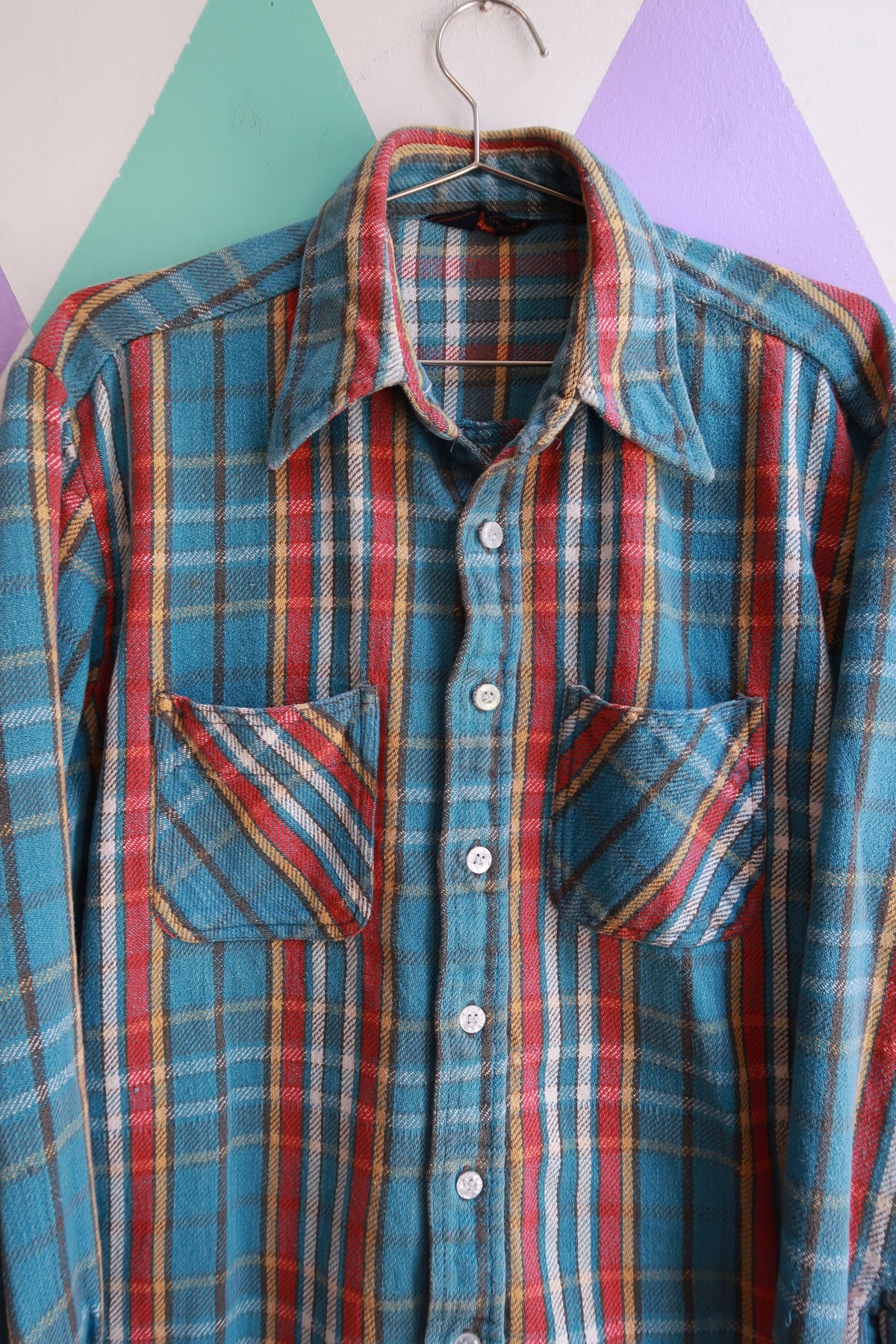 Men's vintage cotton plaid flannel button-up shirt by Elektra Vintage, featuring classic checkered pattern and casual fit.