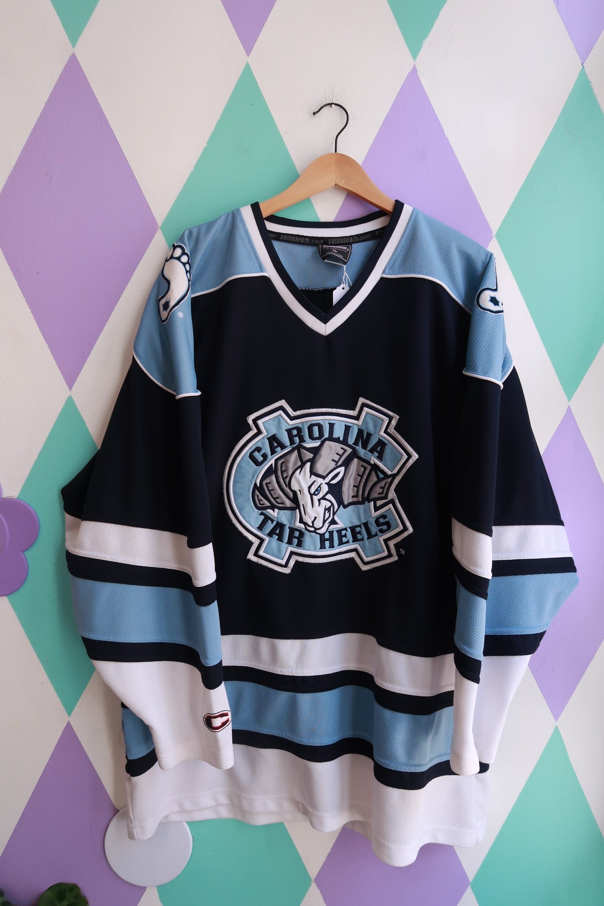 Men's vintage North Carolina Tar Heels hockey jersey by Elektra Vintage, featuring team logo and classic athletic design.