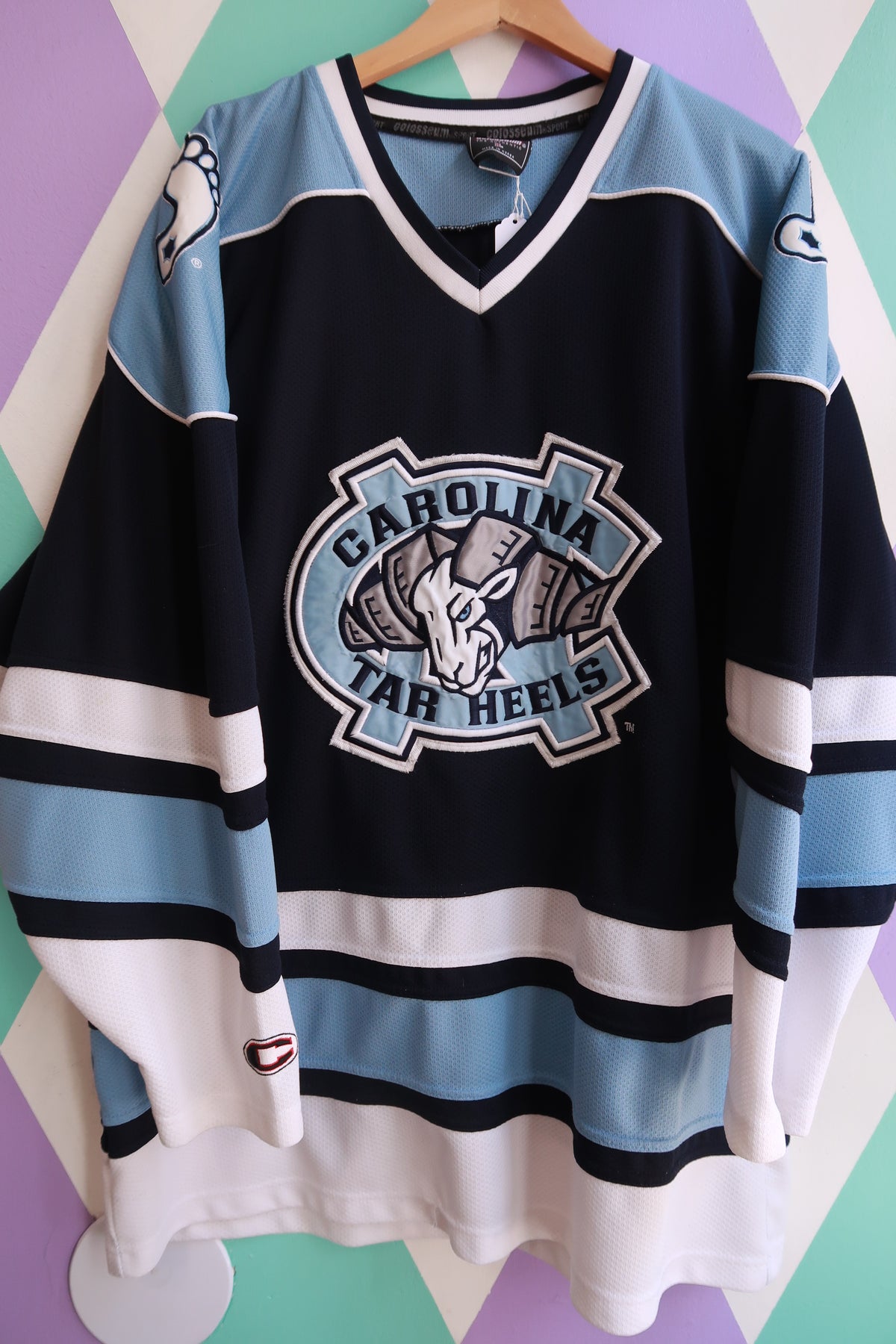 Men's vintage North Carolina Tar Heels hockey jersey by Elektra Vintage, featuring team logo and classic sports design.