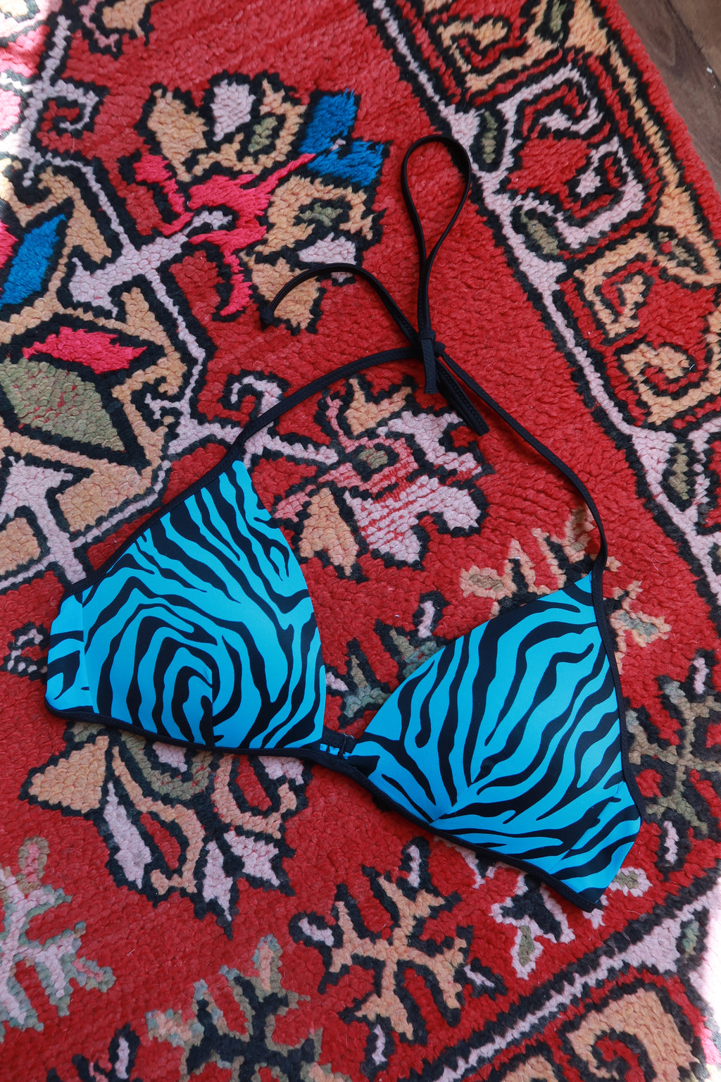 Pink and blue zebra print string bikini top from Elektra Vintage, vintage 2000s swimwear with adjustable ties.