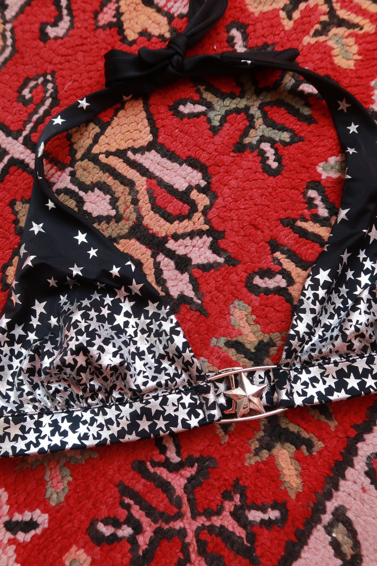 Elektra Vintage vintage 2000s Victoria’s Secret star print halter bikini top with adjustable straps and bold star pattern.
